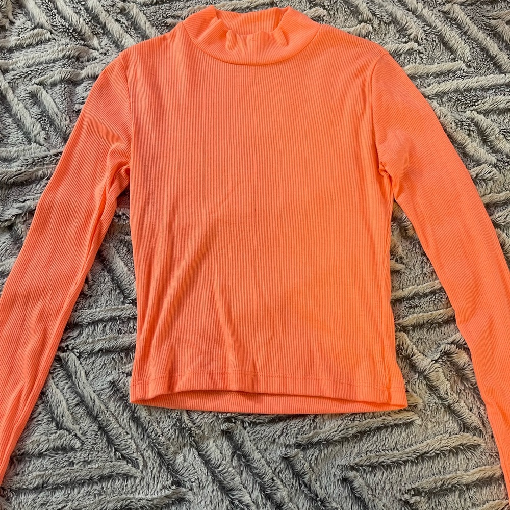 Long sleeve orange cropped turtle neck shirt